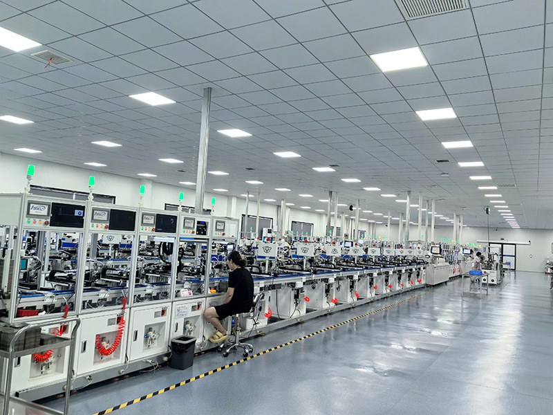 Automated coil winding section for through-hole buzzers at MEIDI factory